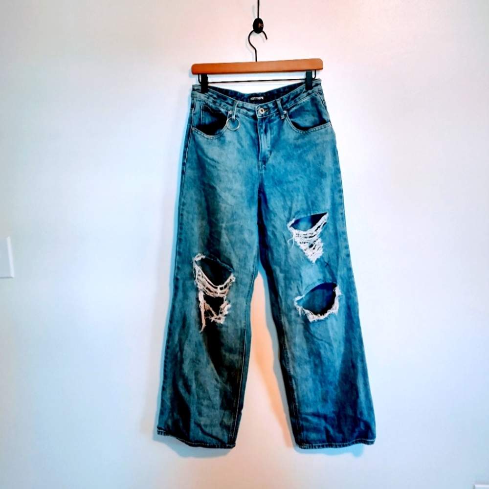 Hot Topic wide leg jeans with distressed holes at the knees.  Size 7